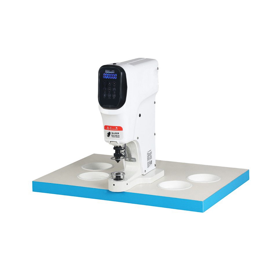 industrial button attaching machine